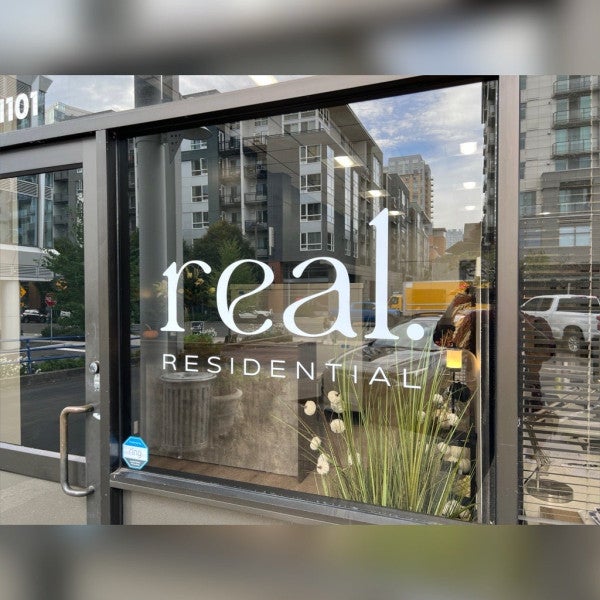 Branded Window Graphics office for Real Residential, Bellevue, WA