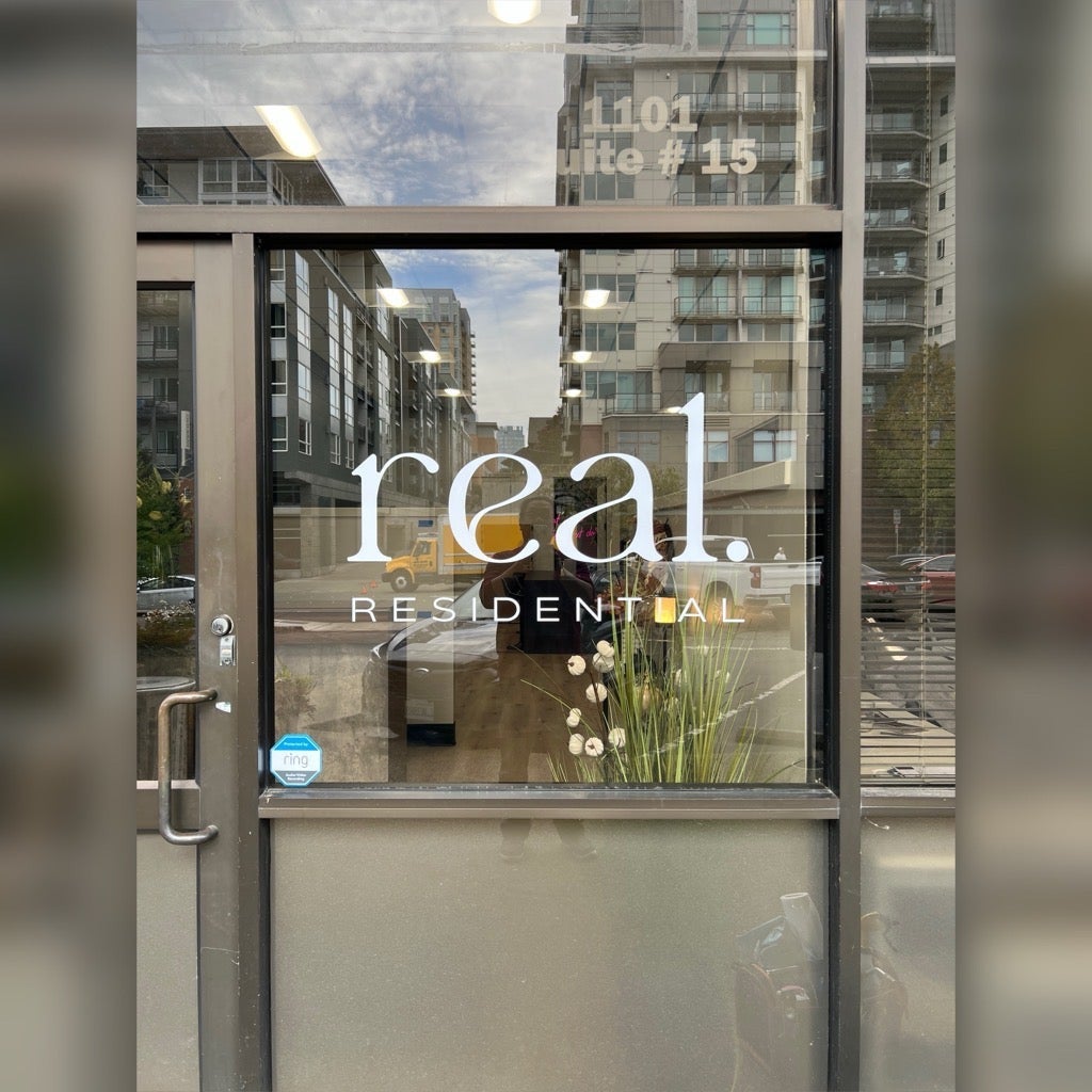 Branded Window Graphics office for Real Residential, Bellevue, WA
