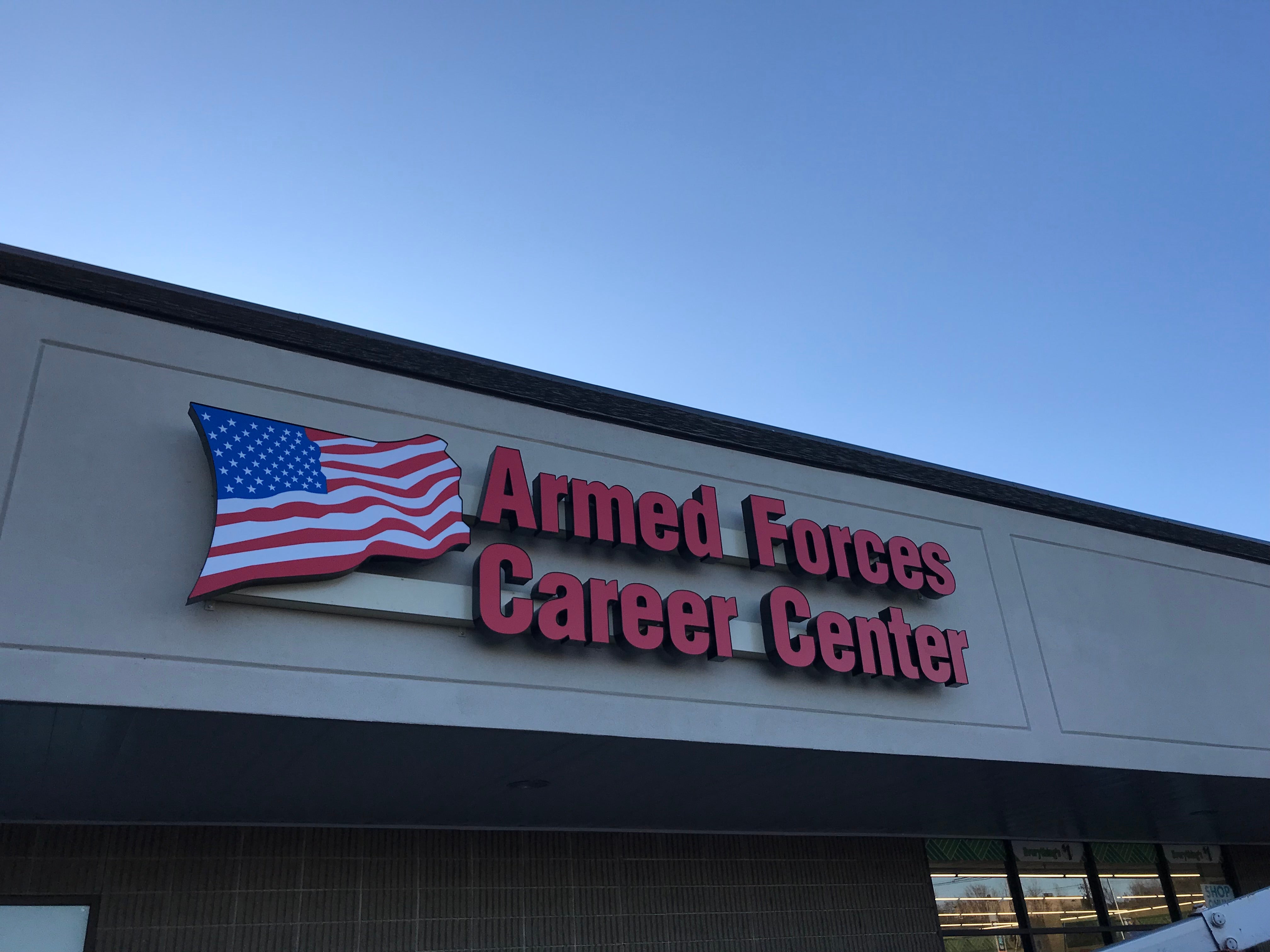 Exterior channel letter sign for Armed Forces Career Center featuring a patriotic American flag design